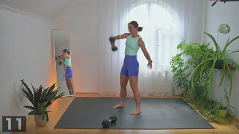Snatch demonstration with one dumbbell