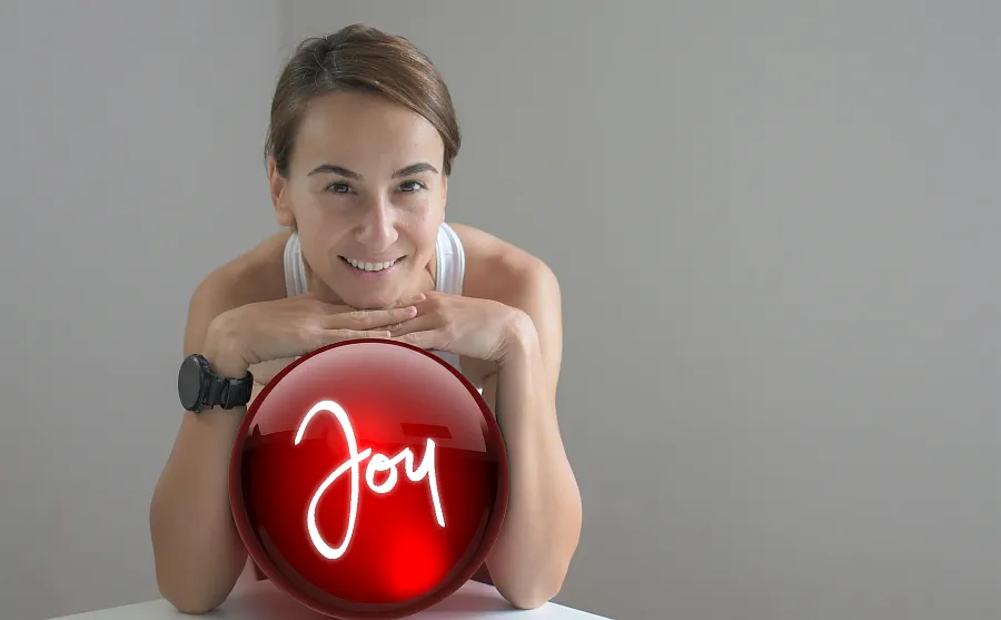 Joy making a welcome gesture