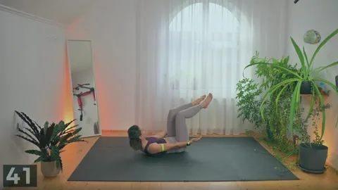 Crunch hold with alternating leg drops demonstration with bodyweight