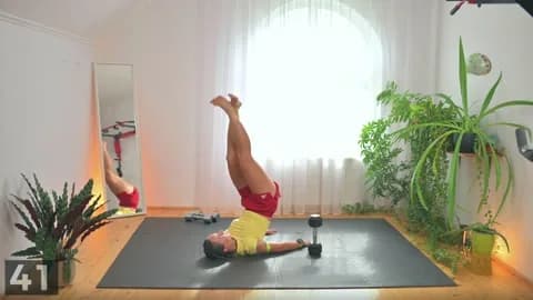 Hip raise demonstration with dumbbell hand supports